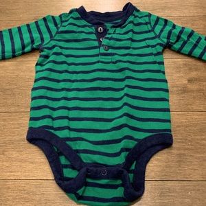 Assortment of Gap and Burt’s Bee onesies size 6-12 months